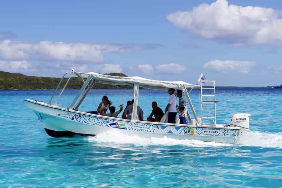 Bora Bora: Jet Ski, Lunch & Shark/ Ray Safari - Riding past Mount Otemanu and the motus