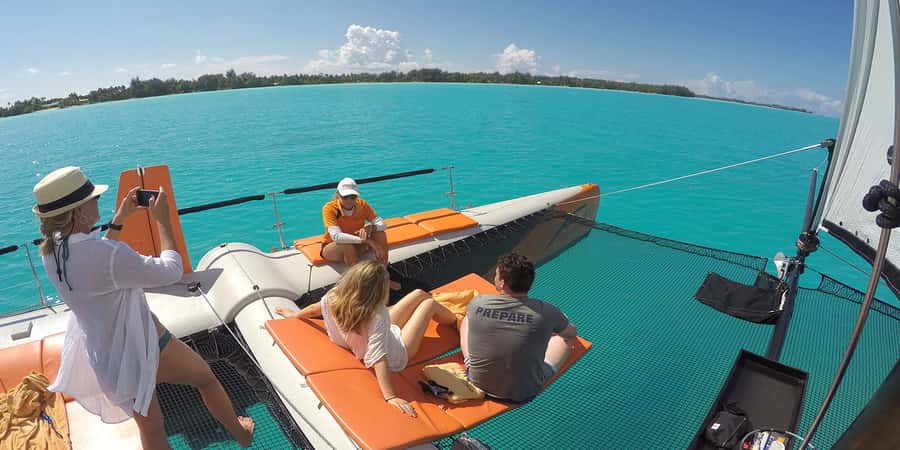 Bora Bora: Sunset Catamaran Cruise with Snacks and Drinks - Sailing past the mountains as the light changes