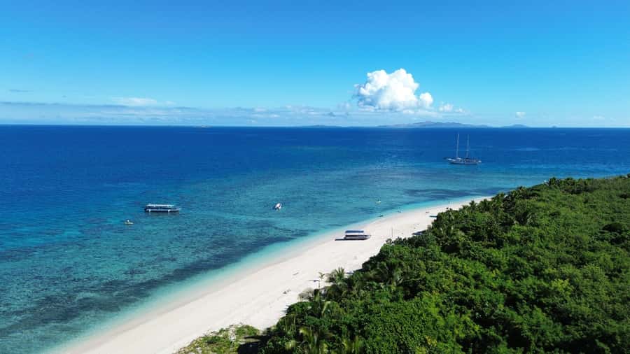 Fiji: Captain Cook Cruises - Island & Reef Day Trip - Kayaks, paddleboards, and slower beach time