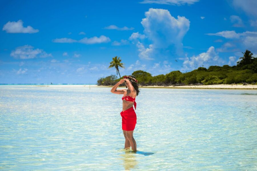 From Tahiti: Tetiaroa Island Tour by Sailing Catamaran - Arriving by dinghy on a protected island