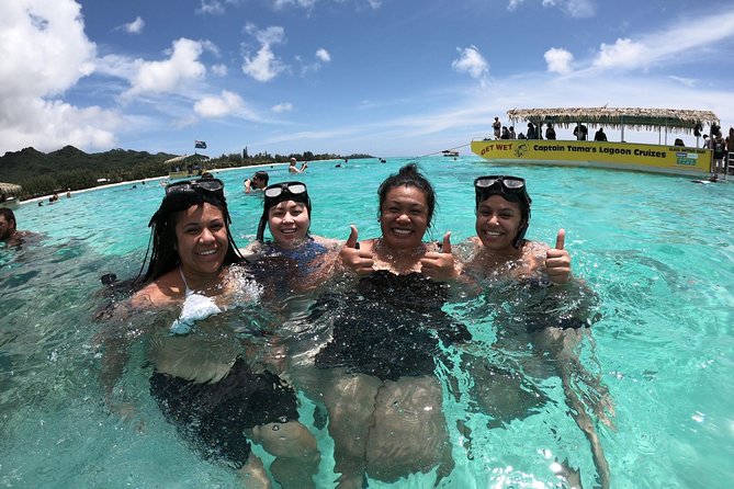 Half-Day Muri Lagoon BBQ Lunch Cruise including Snorkeling - Pareu tying, coconut skills, and island music