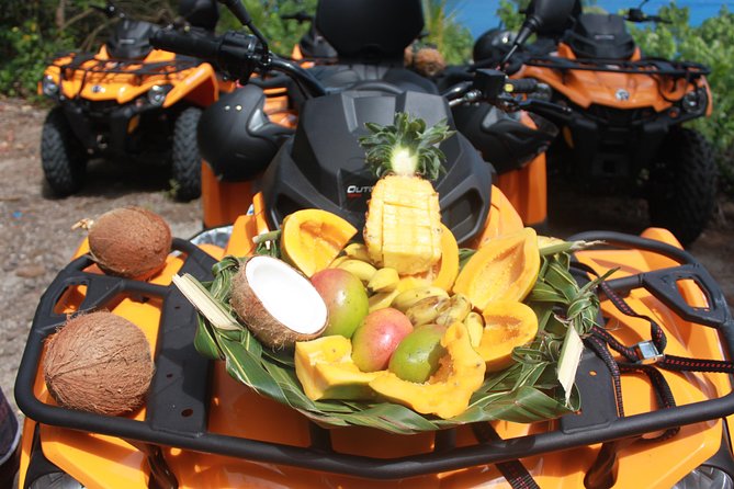 Island Tour & Getaway on the Bora Bora Mountains by Quad / ATV - The family stop for fruit and coconut bread