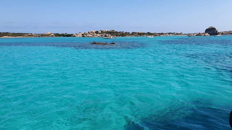 Maddalena Archipelago: Full-Day Sailboat Tour with Lunch - A small sailboat in one of Sardinia’s finest island groups
