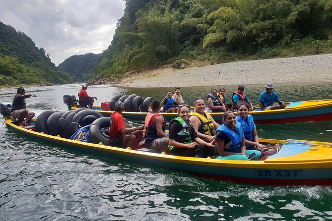 River Tubing Fiji, Navua River - Swimming beneath a waterfall