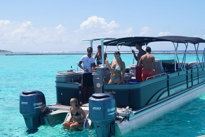 Toa Boat Bora Bora Private Lagoon Tour On Entertainer Bar Boat - Snorkeling among fish, coral, rays, and sharks