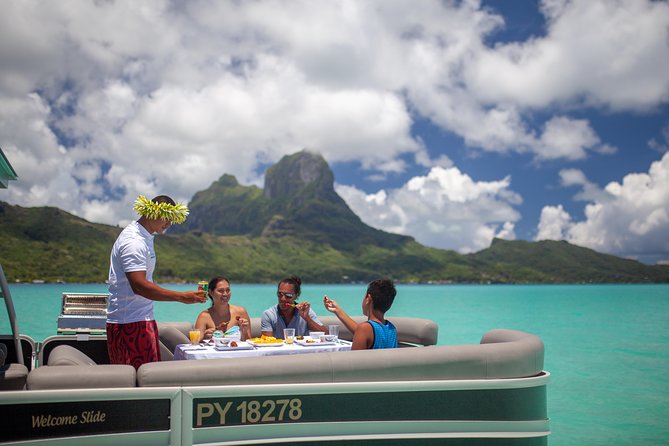 Toa Boat Bora Bora Private Lagoon tour with Lunch on Ambassador Boat - Lunch, drinks, and the onboard rhythm